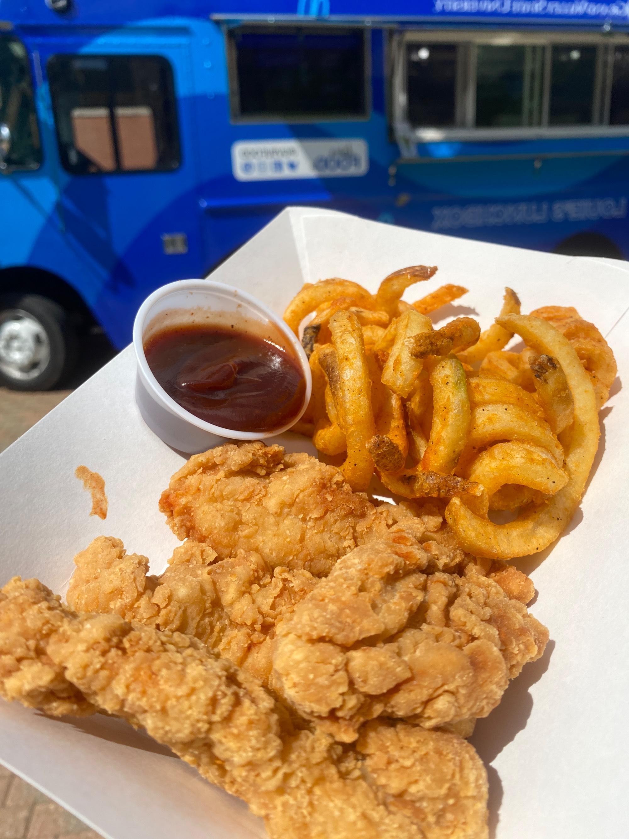 chicken tenders and fries in a basket